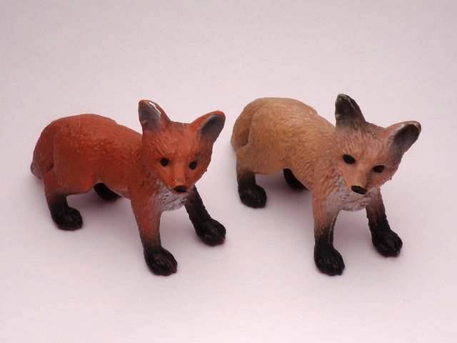 A small red fox figurine.